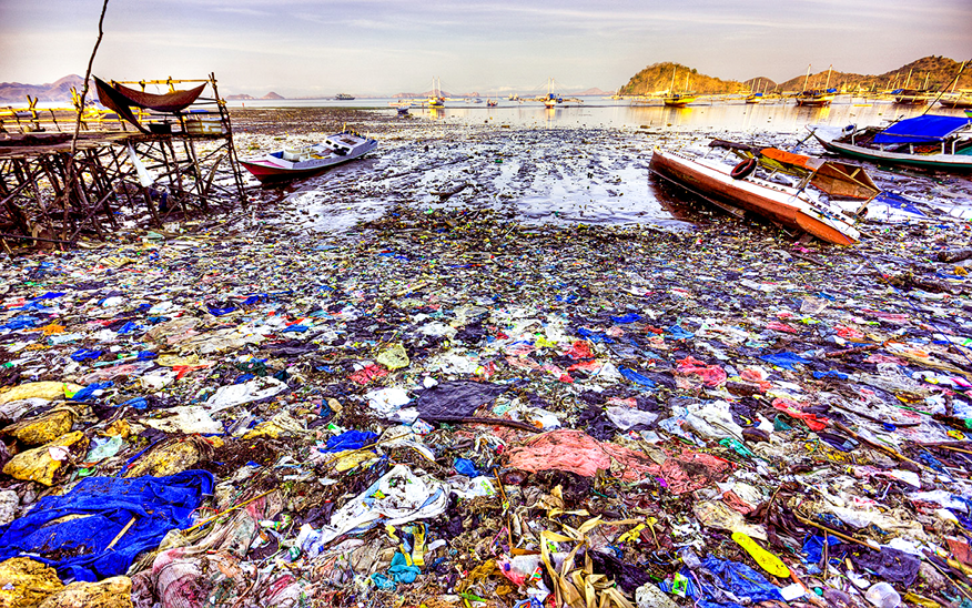 Caption:[UNVERIFIED CONTENT] Plastic trash pollution on beach of Labuan Bajo (Flores Island). It is sad to see that in that small fishing town which is the gateway to the Komodo Islands, a nearby protected nature reserve famous for a species of large lizards (called Komodo dragons). The area also has some of the world's best scuba-diving spots. Unfortunately, indigenous people are still used to throw away trash on road sides and in rivers (which was fine when all that trash was biodegradable, before the invention of plastic). They don't have good waste disposal or recycling facilities. So all the plastic trash ends up in the ocean, and then is washed-up on shore. It's particularly ugly at low tide. This is a major environmental problem that affects all developing countries. Other keywords: environment, environmental impact, pollution, plastic trash, ocean, sea, global, garbage, seashore, fishing village, boats. Oct 12, 2011